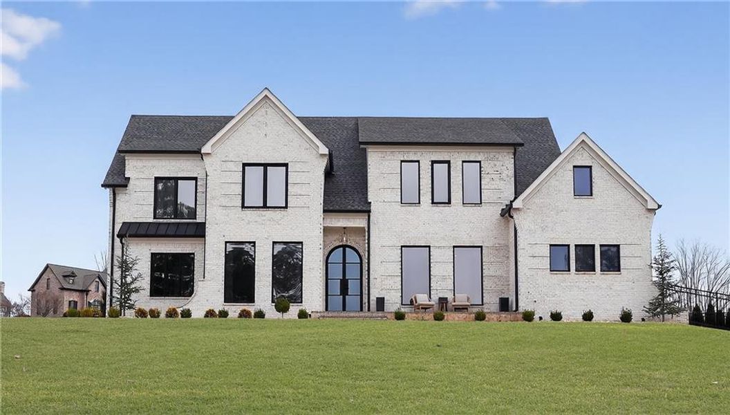 Front exterior of a new home in , Hoschton, GA, highlighting curb appeal (Image 25).