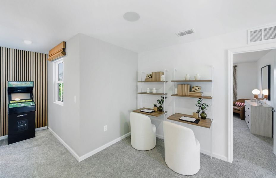 Representative furnished interior of a home built from the Tybee by Pulte Homes in Lakespur Wellen Park, Venice (Image 14).