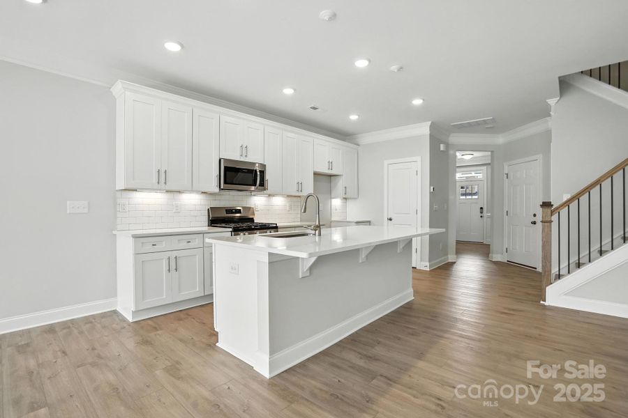 Furnished interior view inside a new home in Harrisburg Village Townhomes, Harrisburg (Image 4).