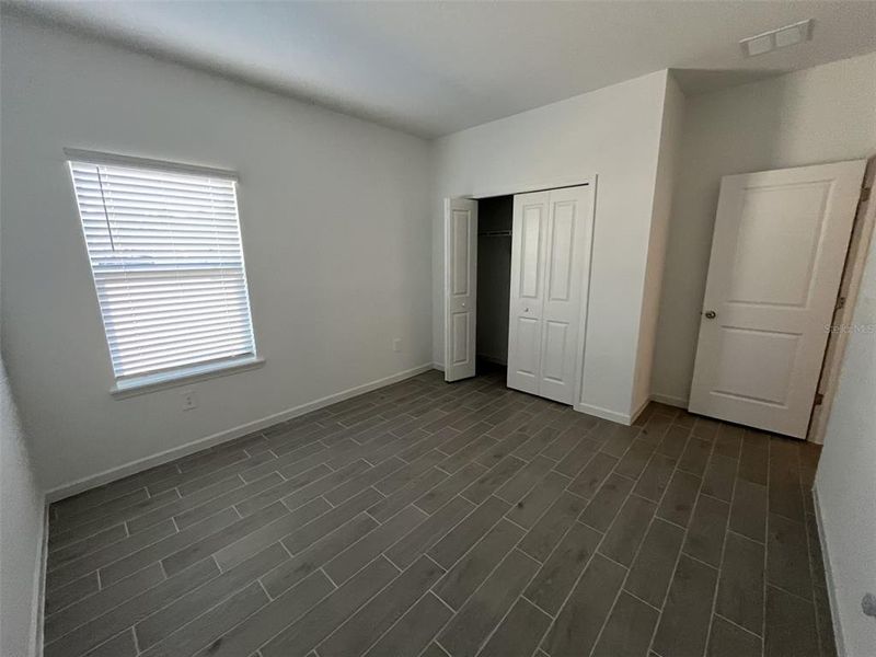 Spacious, unfurnished interior of a new home in Grand Park North, Dunnellon (Image 33).