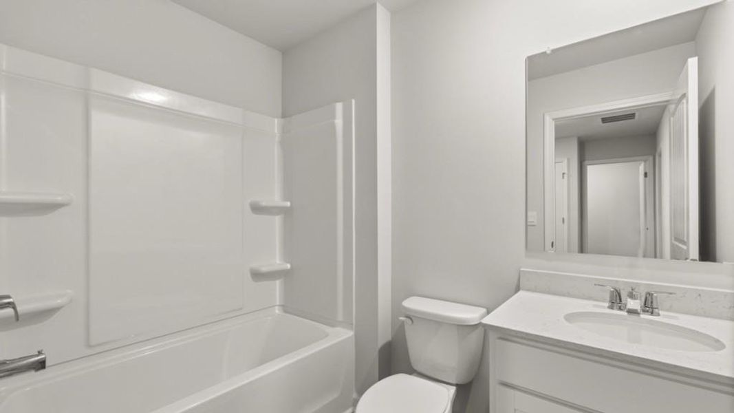 Furnished interior view inside a new home in Waypoint, Flowery Branch (Image 8).