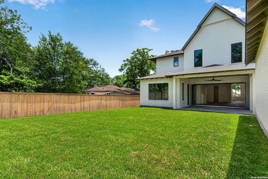 Exterior details and patio area of a home in , Alamo Heights (Image 30).