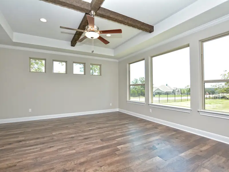 Representative unfurnished interior of a home built from the Santa Barbara II by Giddens Homes in Scofield Farms Estates, Georgetown (Image 106).