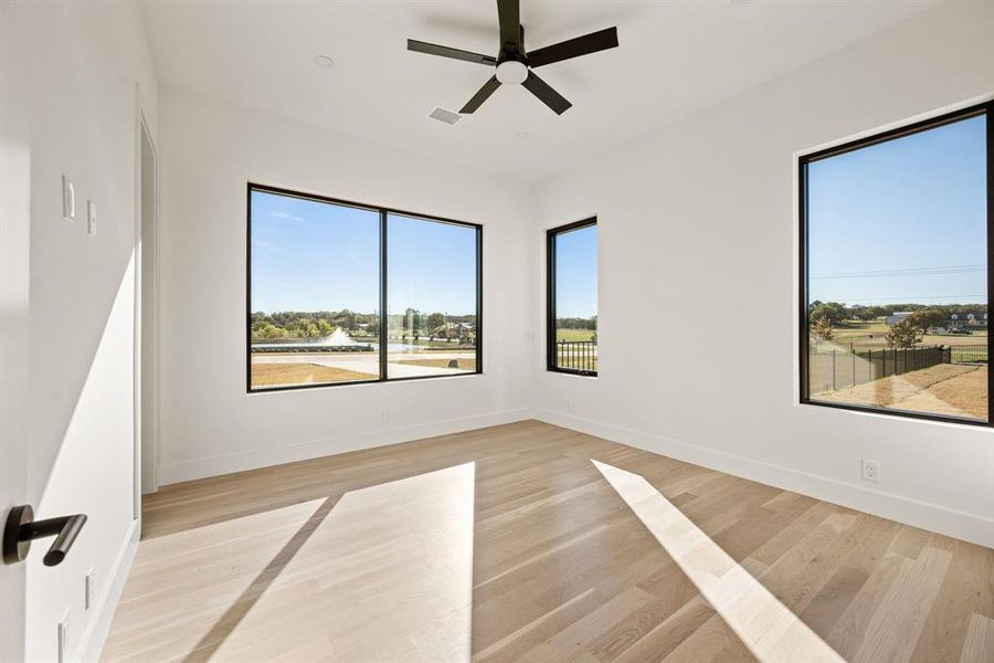 Secondary bedroom with large windows and natural light. Secondary bedroom with large windows and natural light.