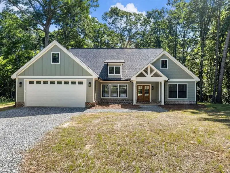 Front exterior of a new home in , Cleveland, GA, highlighting curb appeal (Image 1). Front exterior of a new home in , Cleveland, GA, highlighting curb appeal (Image 1).