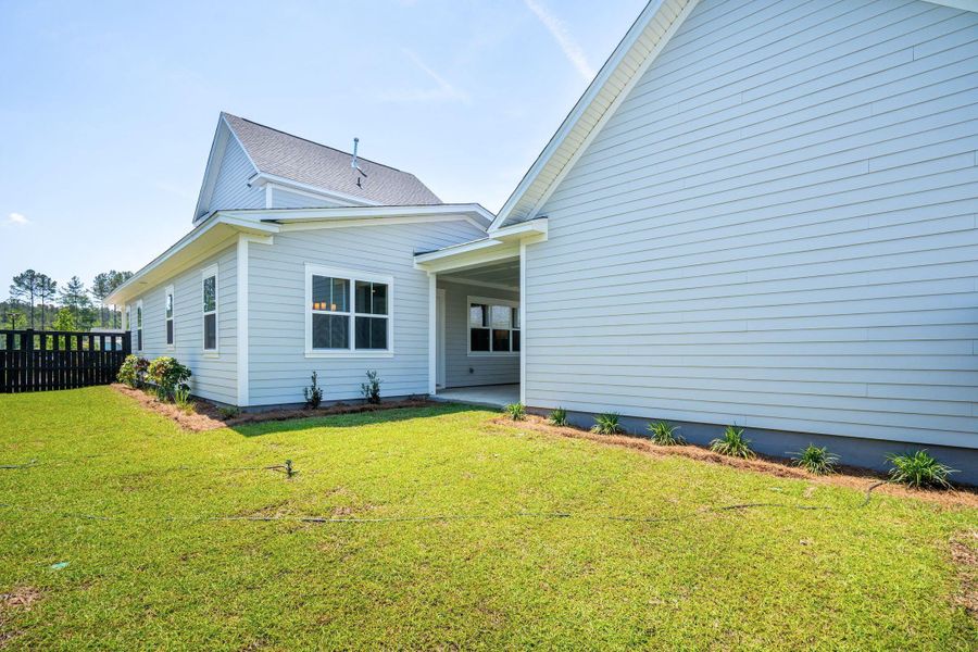 Exterior details and patio area of a home in The Domus Collection at Midtown Nexton, Summerville (Image 22).
