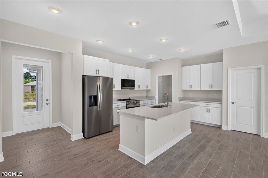 Furnished interior view inside a new home in Cape Coral, Cape Coral (Image 5).
