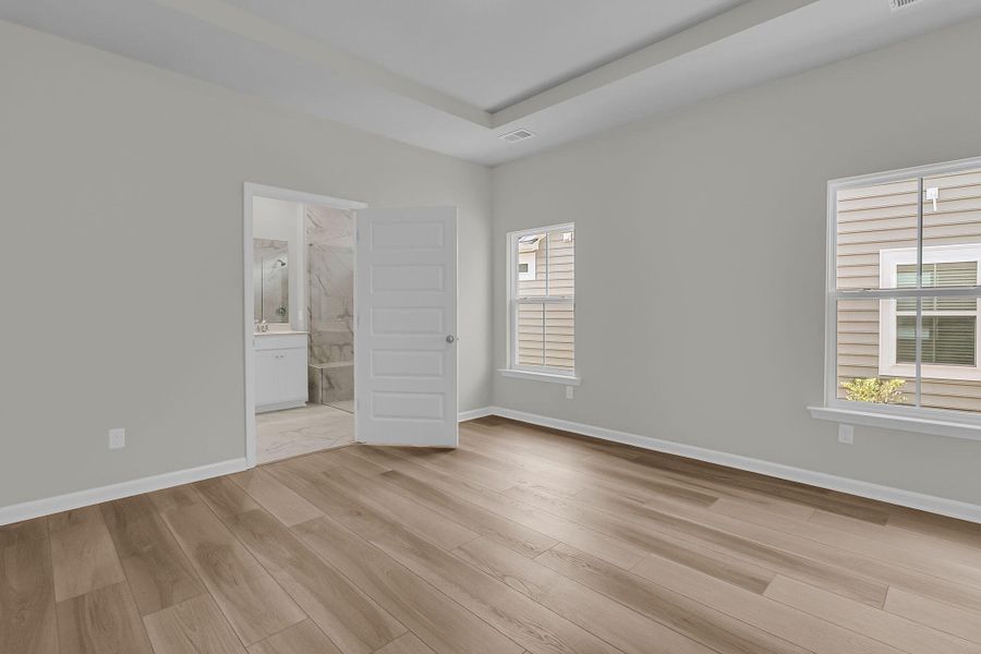 Spacious, unfurnished interior of a new home in Horizons at Summers Corner | 55+: The Cottages, Summerville (Image 34). Spacious, unfurnished interior of a new home in Horizons at Summers Corner | 55+: The Cottages, Summerville (Image 34).