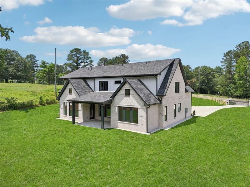 Front exterior of a new home in , Braselton, GA, highlighting curb appeal (Image 54). Front exterior of a new home in , Braselton, GA, highlighting curb appeal (Image 54).