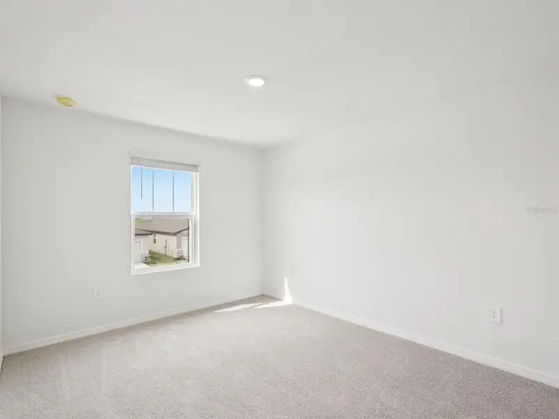 Spacious, unfurnished interior of a new home in Magnolia Bay - Classic Series, Nokomis (Image 19).