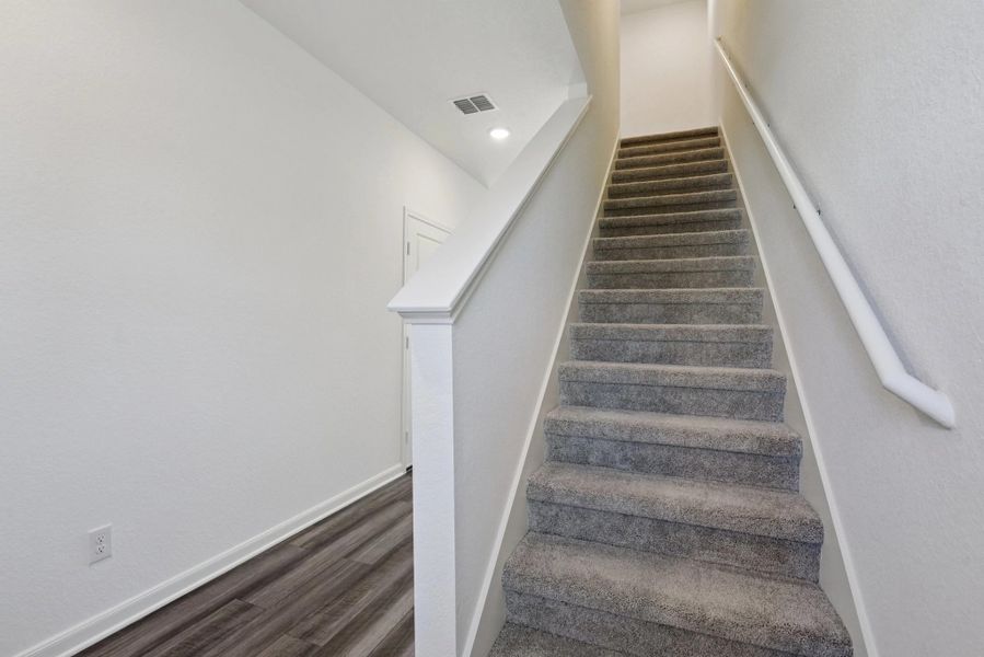 Representative unfurnished interior of a home built from the Compass by Starlight Homes in The Wilder, Adkins (Image 18).