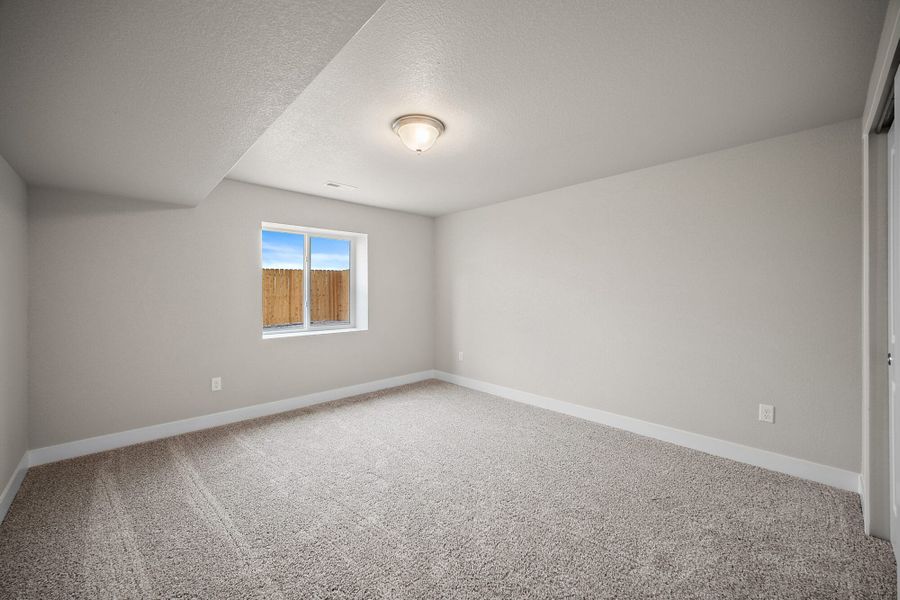 Spacious, unfurnished interior of a new home in Ridge at Lorson Ranch, Colorado Springs (Image 34).