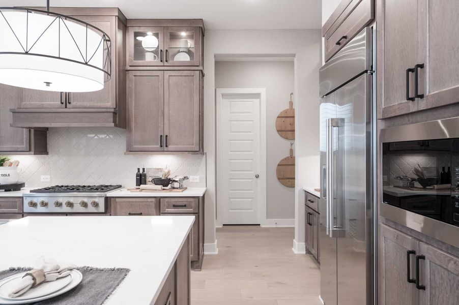 Representative furnished interior of a home built from the Milan by Tri Pointe Homes in Dunham Pointe, Cypress (Image 43).