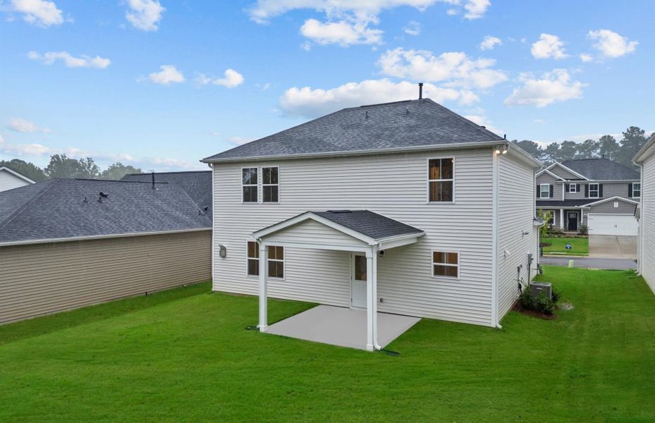 Exterior details and patio area of a home in Briarwood Reserve, Spartanburg (Image 24).