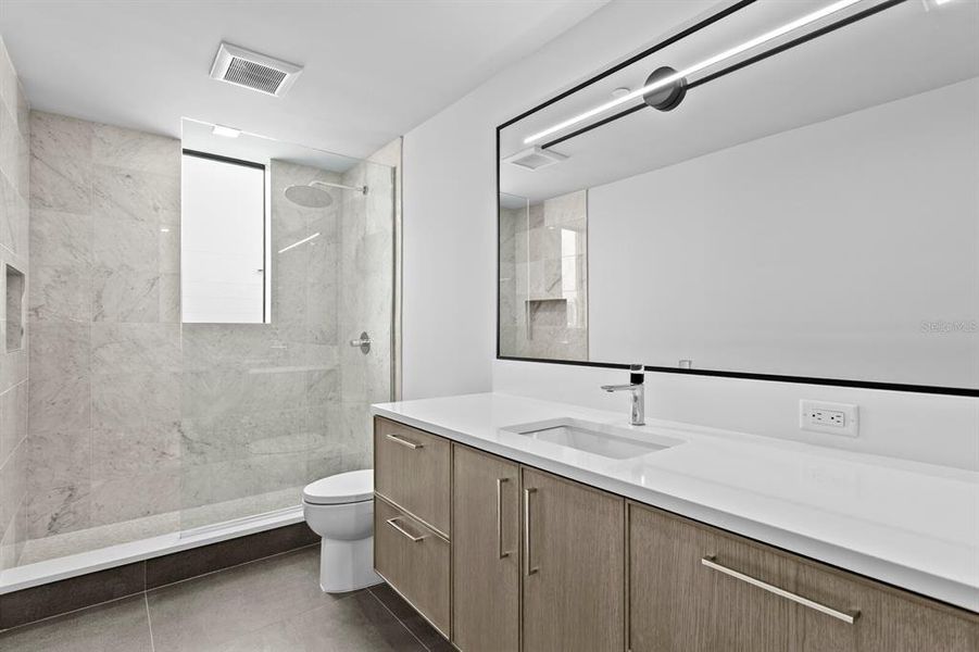 Furnished interior view inside a new home in , Indian Rocks Beach (Image 18).