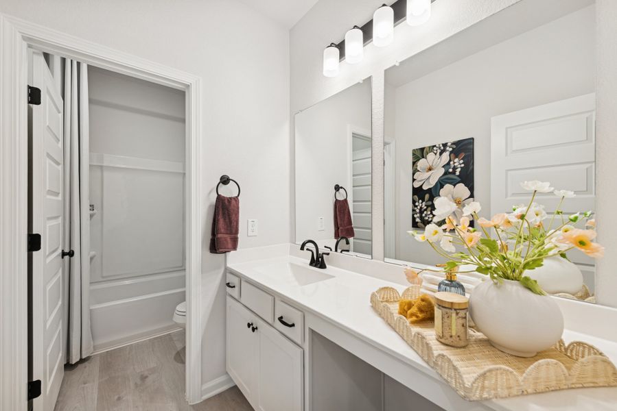 The Princeton II- Hall Bath with Dual Vanities. Staged model home shown for illustration only; actual features, colors, and upgrades may vary. The Princeton II- Hall Bath with Dual Vanities. Staged model home shown for illustration only; actual features, colors, and upgrades may vary.