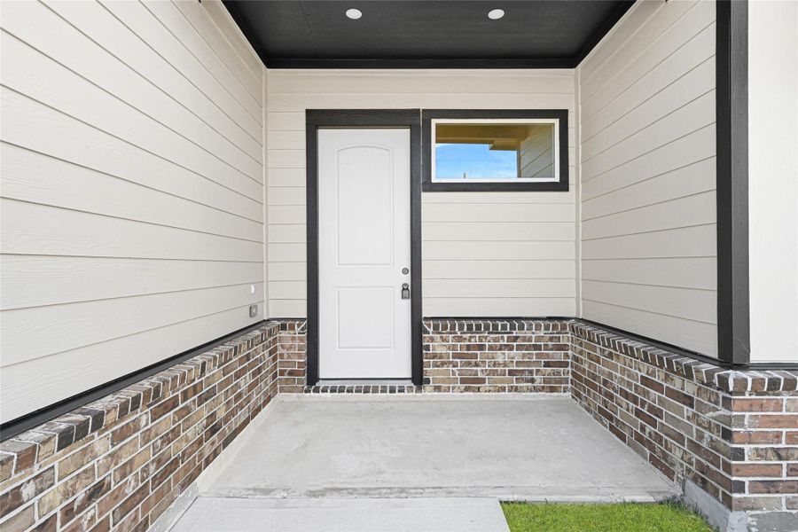 Exterior details and patio area of a home in , Huffman (Image 4). Exterior details and patio area of a home in , Huffman (Image 4).