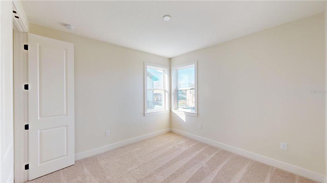 Spacious, unfurnished interior of a new home in Laureate Park, Orlando (Image 26).