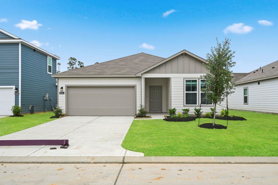 Front exterior of a new home in Crockett Meadows, Conroe, TX, highlighting curb appeal (Image 19).