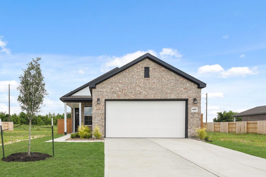 Front exterior of a new home in River Ranch Trails, Dayton, TX, highlighting curb appeal (Image 16). Front exterior of a new home in River Ranch Trails, Dayton, TX, highlighting curb appeal (Image 16).