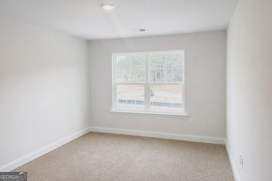 Spacious, unfurnished interior of a new home in Canterbury Villas, Carrollton (Image 15).
