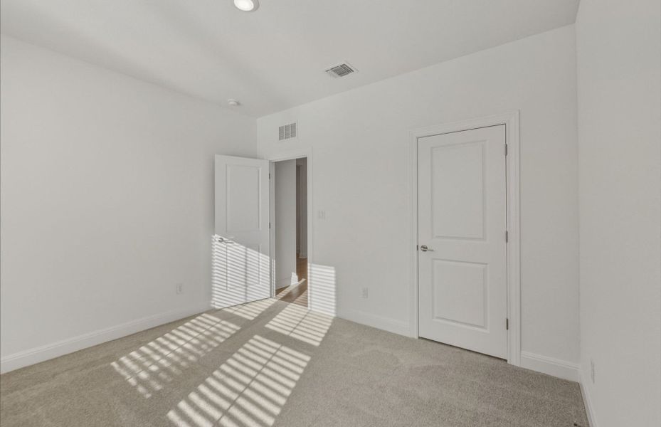 Spacious, unfurnished interior of a new home in Saddleback at Santa Rita Ranch, Liberty Hill (Image 34).