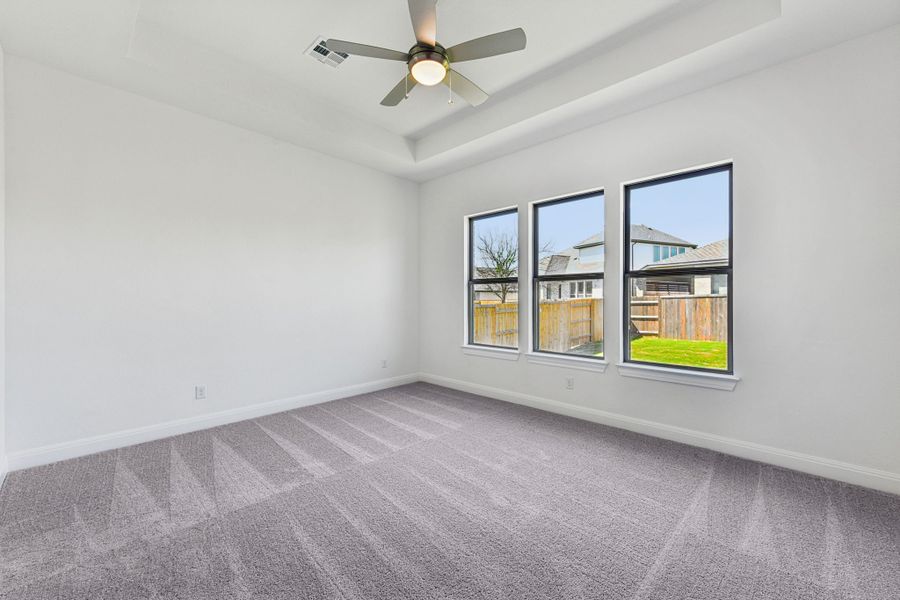 Spacious, unfurnished interior of a new home in 6 Creeks, Kyle (Image 11).