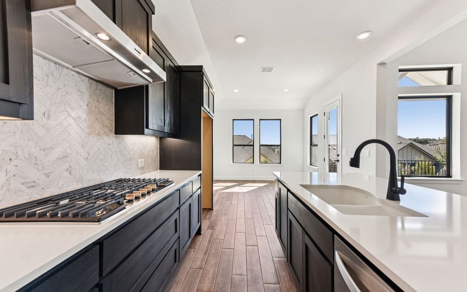 Furnished interior view inside a new home in Kissing Tree, San Marcos (Image 6).