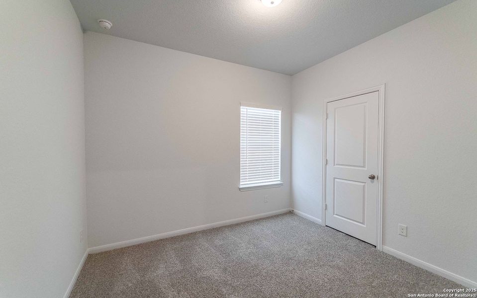 Spacious, unfurnished interior of a new home in Red Hawk Landing, San Antonio (Image 9).