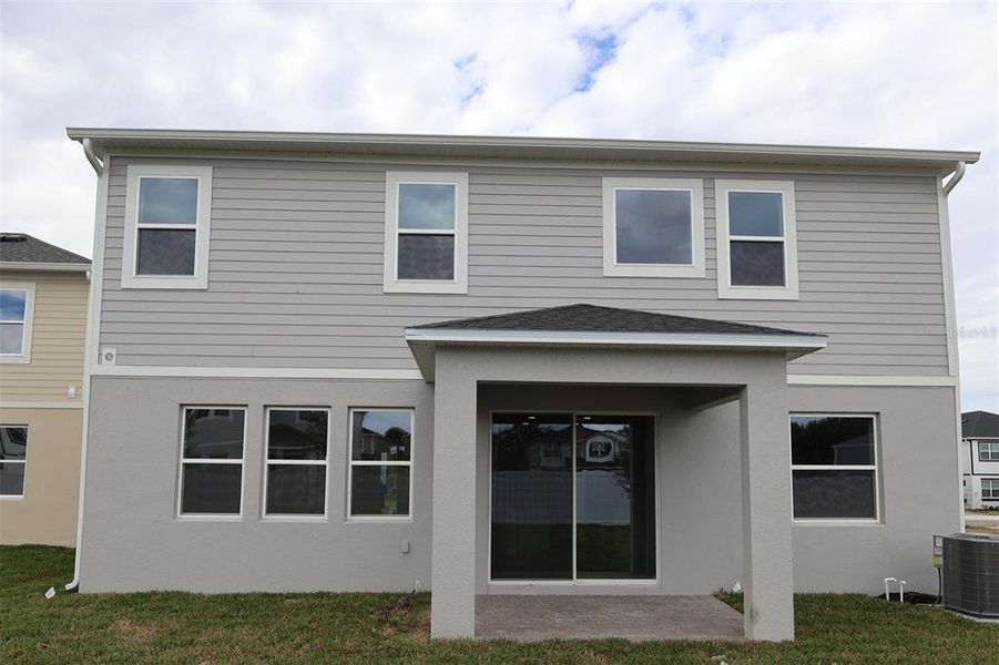 Exterior details and patio area of a home in Estates at Rivercrest, Sanford (Image 3). Exterior details and patio area of a home in Estates at Rivercrest, Sanford (Image 3).