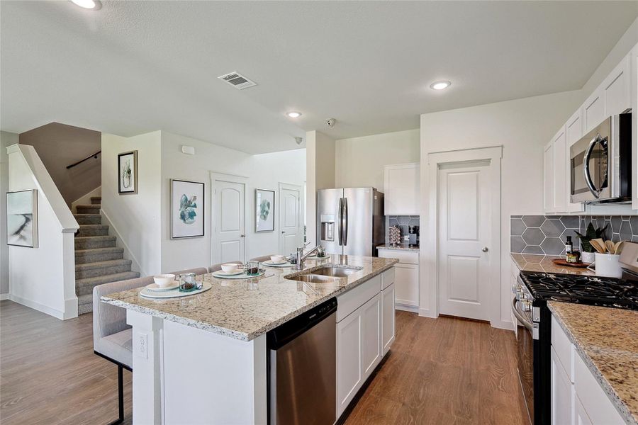 Model home photos of similar floorplans, not pictures of actual home.