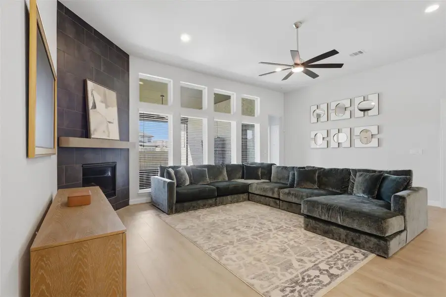 Gas fireplace and a wall of windows bringwarmth and abundant natural light to the mainliving area. Gas fireplace and a wall of windows bringwarmth and abundant natural light to the mainliving area.
