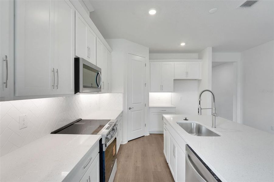 Furnished interior view inside a new home in Tuscan Hills, Dade City (Image 7).