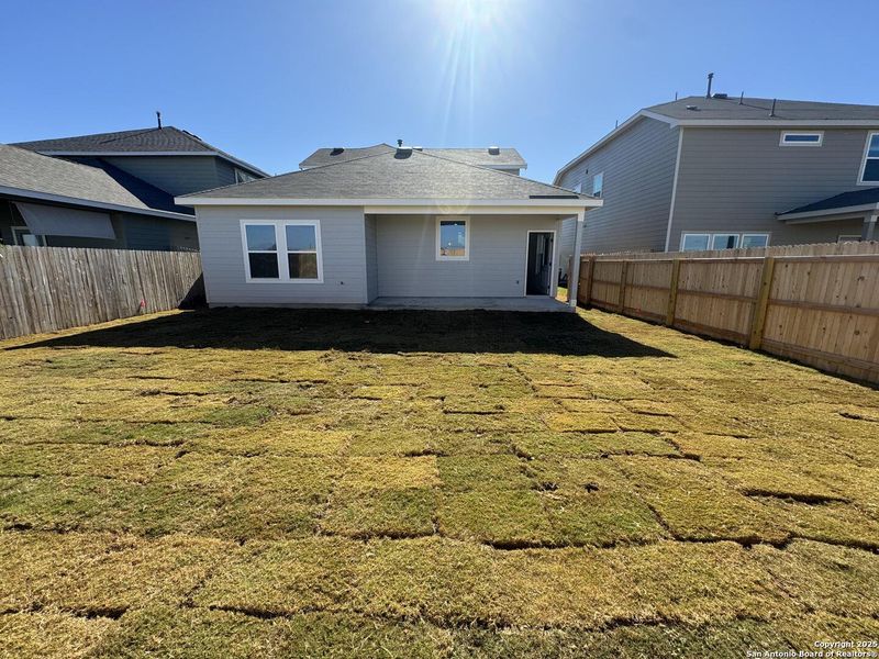 Exterior details and patio area of a home in Enclave at Hennersby Hollow 50's, San Antonio (Image 19).