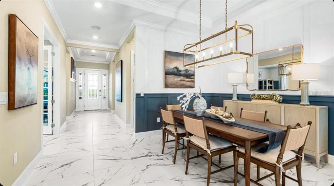 Furnished interior view inside a new home in Esplanade at Wellen Park, Englewood (Image 11).