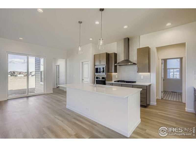 Furnished interior view inside a new home in RainDance - 60s, Windsor (Image 9).