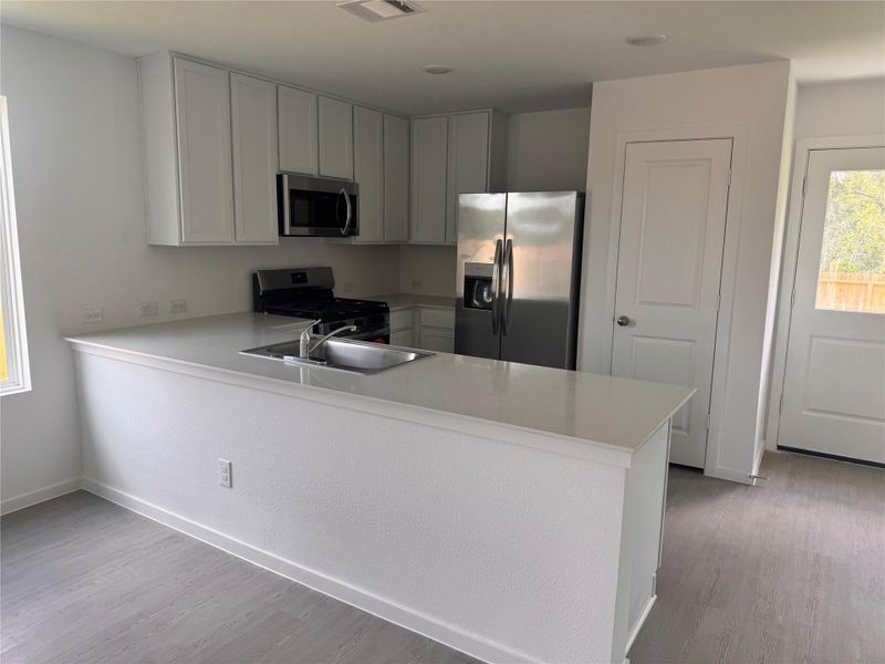 Furnished interior view inside a new home in Pinewood Trails, Cleveland (Image 6).