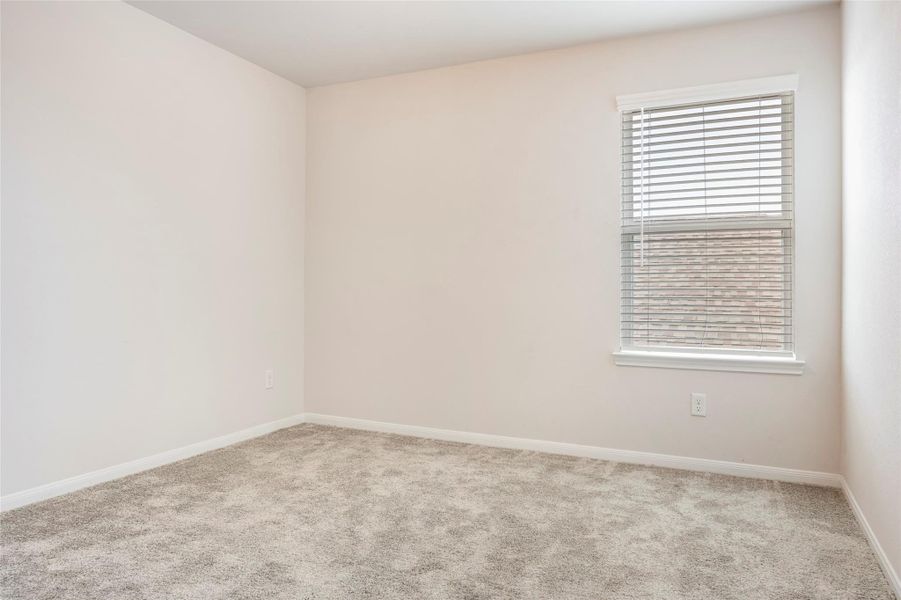 Spacious, unfurnished interior of a new home in Sunterra, Katy (Image 35).