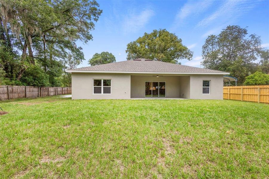 Front exterior of a new home in , Lake Helen, FL, highlighting curb appeal (Image 2).