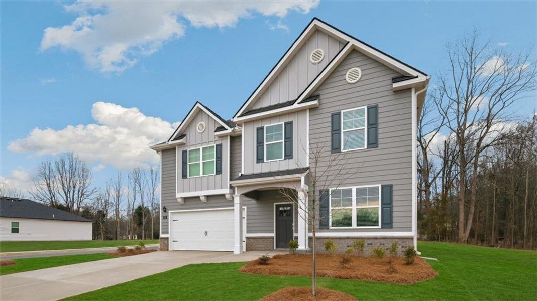 Front exterior of a new home in Jackson Landing, Jefferson, GA, highlighting curb appeal (Image 1). Front exterior of a new home in Jackson Landing, Jefferson, GA, highlighting curb appeal (Image 1).