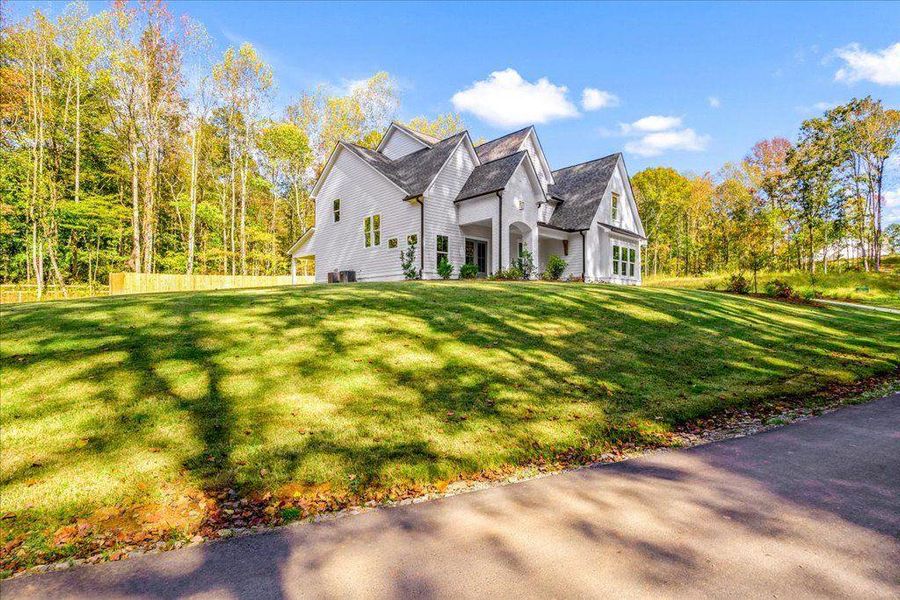 Front exterior of a new home in , Gainesville, GA, highlighting curb appeal (Image 19).