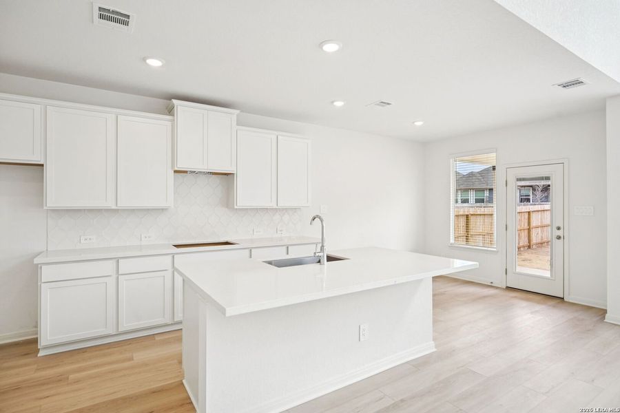 Furnished interior view inside a new home in Estancia Ranch - Classic Series, San Antonio (Image 32).