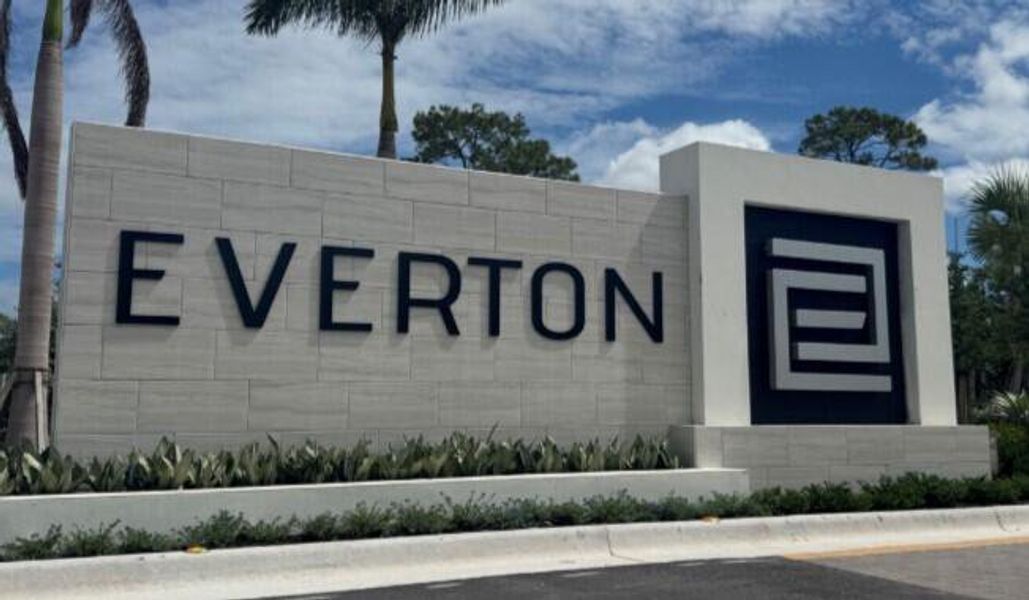 Front exterior of a new home in Everton, Lantana, FL, highlighting curb appeal (Image 14).