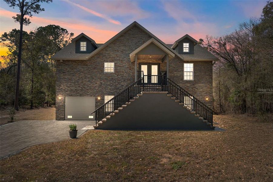 Front exterior of a new home in , Webster, FL, highlighting curb appeal (Image 29).