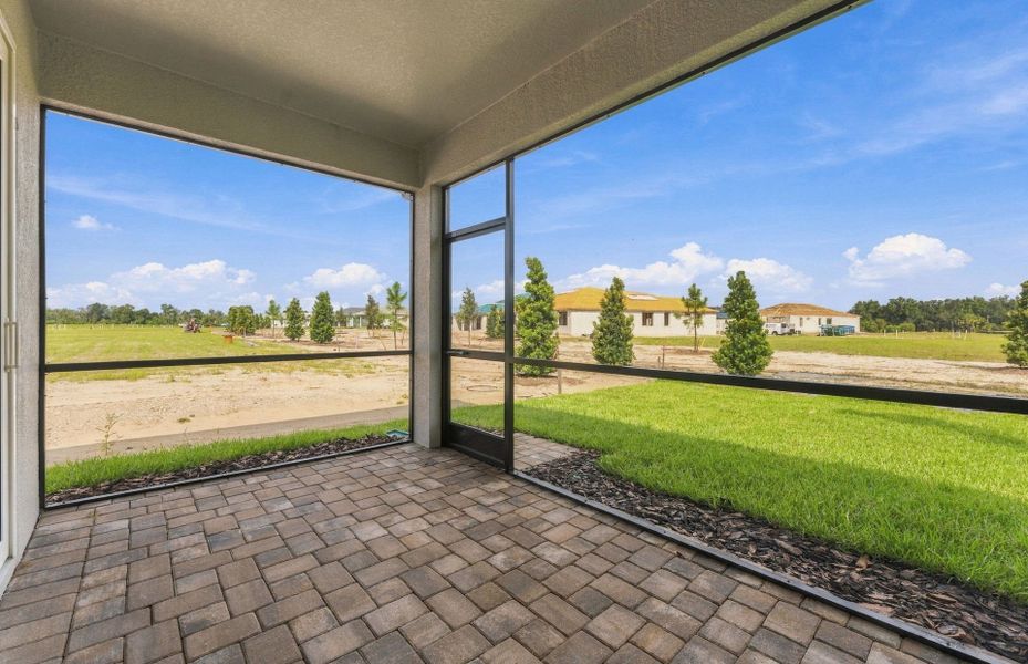 Exterior details and patio area of a home in Explore North River Ranch, Parrish (Image 4).