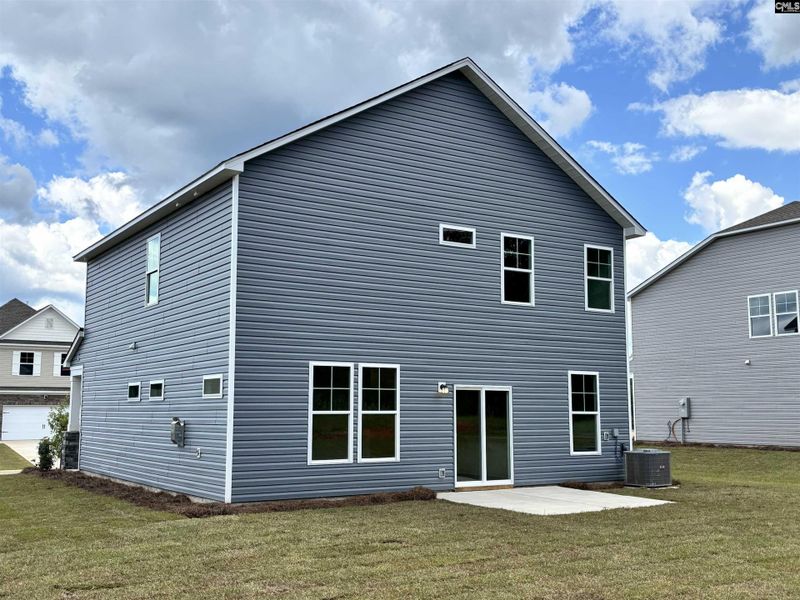 Front exterior of a new home in Rolling Hills, Prosperity, SC, highlighting curb appeal (Image 5).