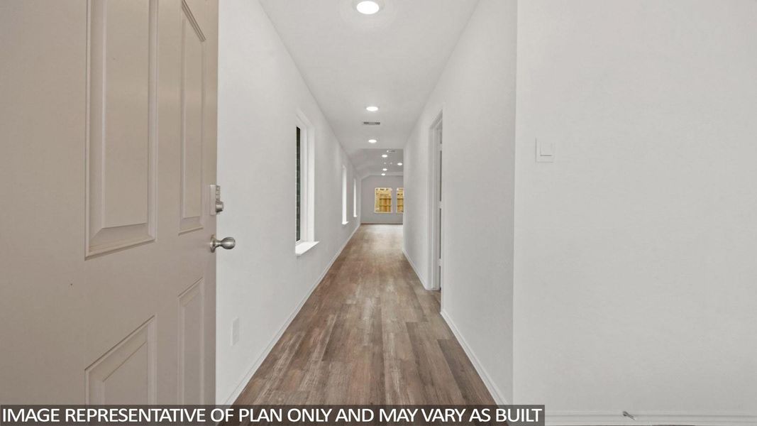 Spacious, unfurnished interior of a new home in Sunterra, Katy (Image 11).