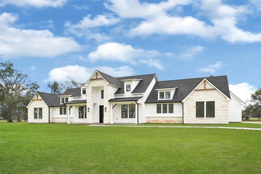 Front exterior of a new home in , Rosharon, TX, highlighting curb appeal (Image 21).