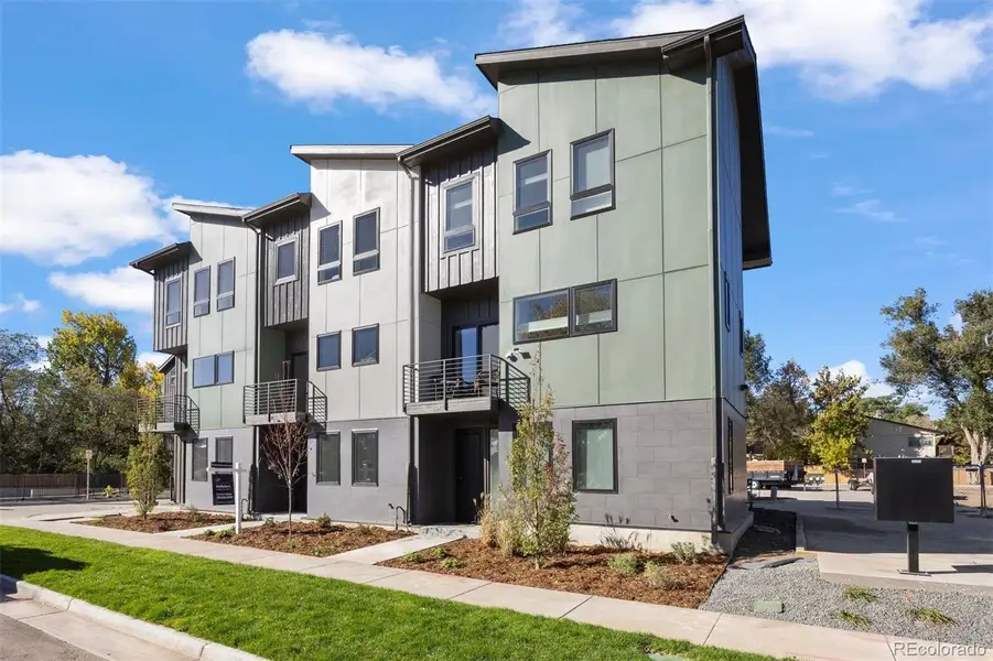 Front exterior of a new home in , Arvada, CO, highlighting curb appeal (Image 1).