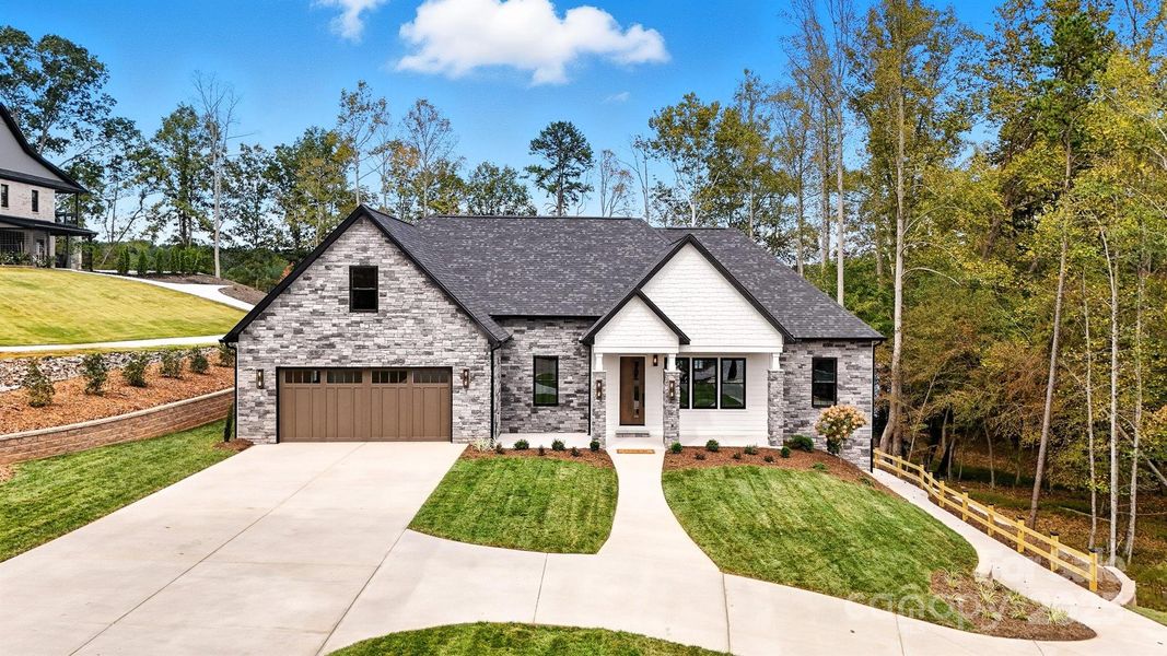 Front exterior of a new home in , Granite Falls, NC, highlighting curb appeal (Image 1). Front exterior of a new home in , Granite Falls, NC, highlighting curb appeal (Image 1).